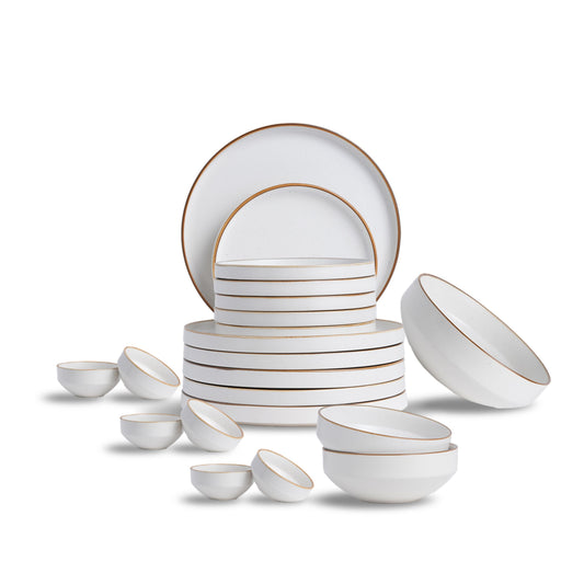 13-piece Japandi white matte ceramic dinner set arranged on a plain background